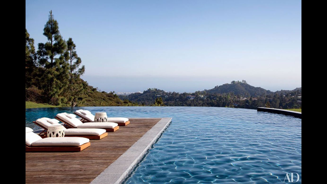 The pools of Hollywood A-listers include infinity-edge marvels and oceanfront stunners.<br /><br />At Gisele Bündchen and Tom Brady's Los Angeles home, an infinity pool offers views of the city, with the Pacific Ocean in the distance.<br />Text by <strong>Carrie Hojnicki</strong>,<strong> </strong><a href="http://www.architecturaldigest.com/celebrity-homes/2014/celebrity-swimming-pools-slideshow" target="_blank" target="_blank"><strong>Architectural Digest </strong></a>