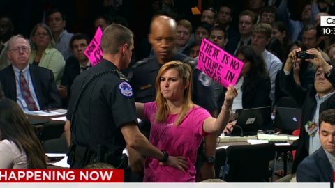 nr sot mccain protester isis hearing_00003003.jpg