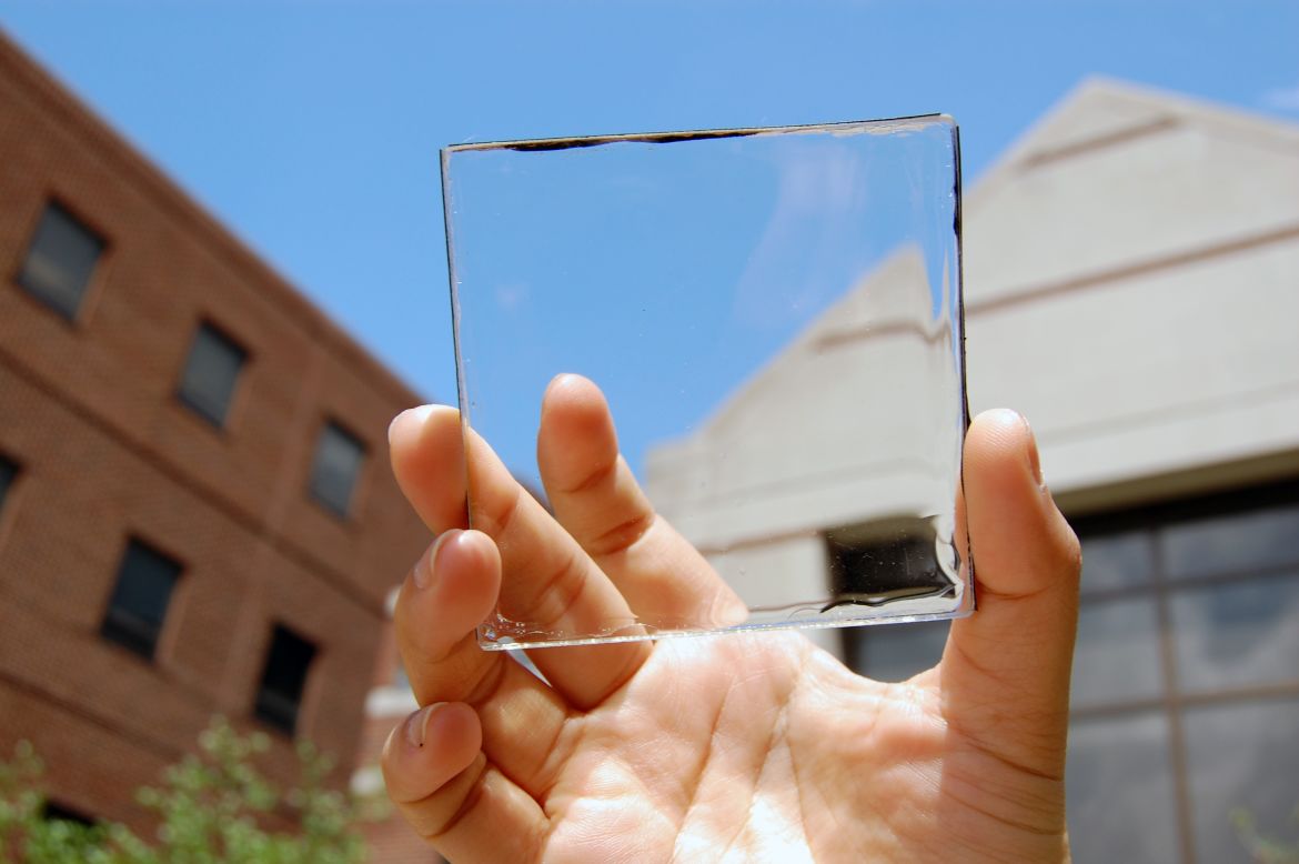 <strong>Solar power with a view</strong><br /><br />A new solar concentrator has been developed which can be placed over windows to create solar energy -- without obstructing your view. The most efficient solar cells to date are often colored to absorb the sun's rays more efficiently, but if made transparent they could become a lot more versatile.<br /><br />The transparent device is being developed by Richard Lunt's team at Michigan State University and can be placed on anything with a clear surface, ranging from the facade of a building to a computer screen. <br /><br />The solar harvesting system uses small organic molecules which absorb specific non-visible wavelengths of sunlight such as ultraviolet and near infrared. These in turn are made to 'glow' at another wavelength in the non-visible infrared which is guided to photovoltaics on the edges for conversion into electricity, whilst maintaining transparency.<br /><br />The technology is at an early stage and very little energy is currently converted into electricity, but it has the potential to be scaled to commercial or industrial applications.