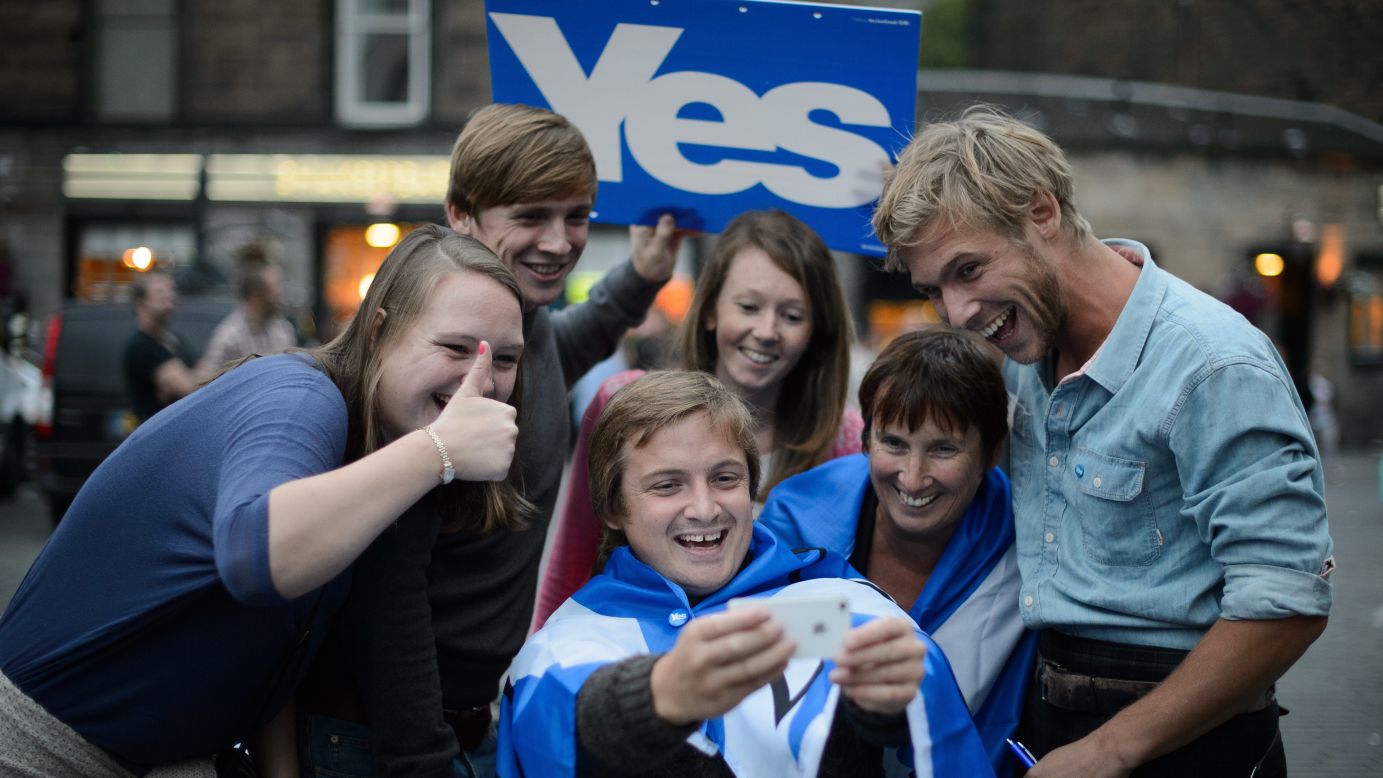 Supporters of Scottish independence take a selfie ahead of a concert in Edinburgh, Scotland, on Sunday, September 14. Scots will head to the polls on Thursday, September 18, to vote on <a href="http://www.cnn.com/2014/09/12/europe/gallery/scottish-referendum/index.html">a referendum</a> that could end Scotland's 307-year union with England and Wales as Great Britain -- and launch it into the world as an independent nation.