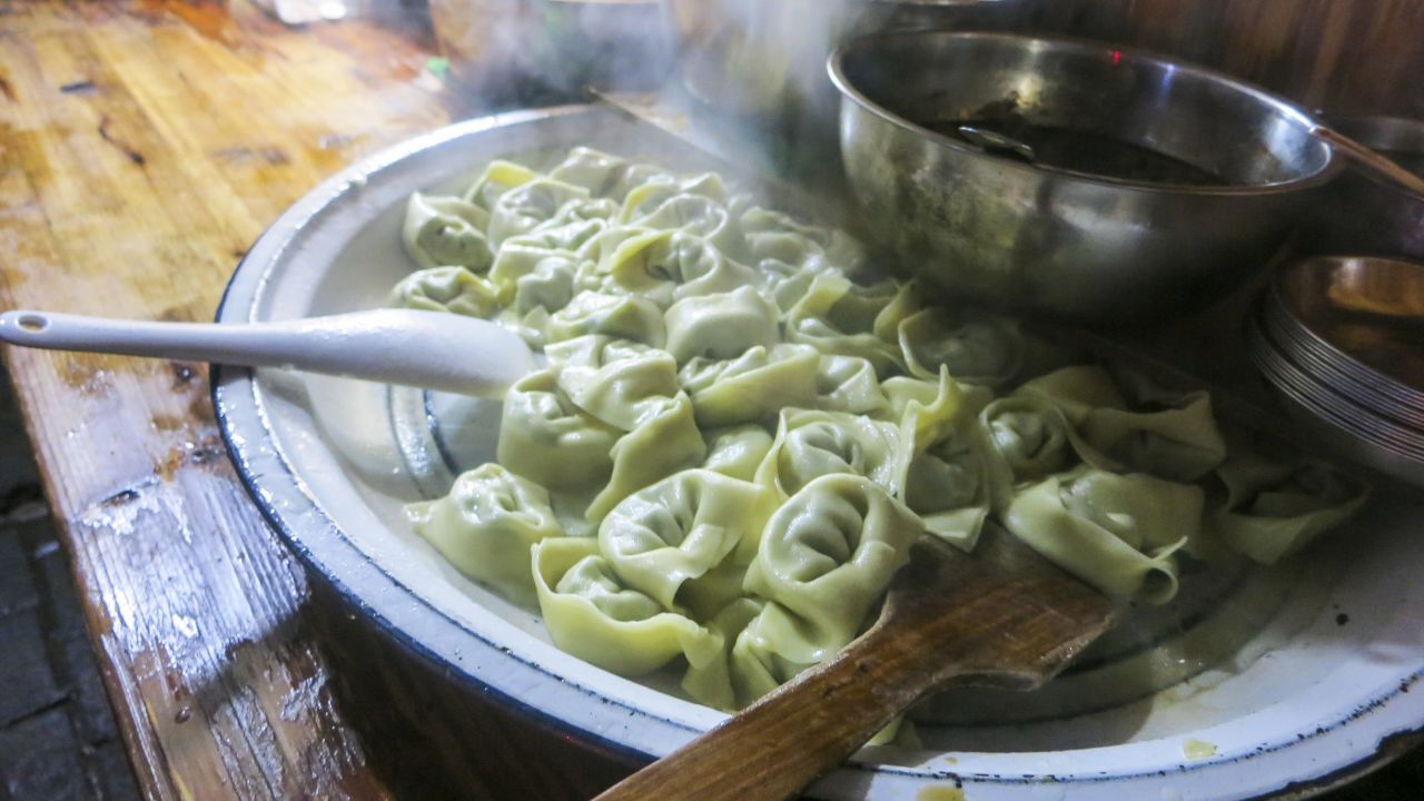 Bourdain stops in to Er Guang Wonton to <a href="http://www.cnn.com/2014/09/22/living/shanghai-dumplings-parts-unknown-eatocracy/">sample wontons</a> filled with minced pork, bok choy, ginger, rice wine and soy. 