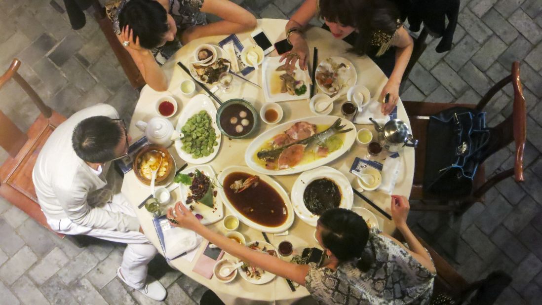 In Shanghai, the traditional way to eat is family style.