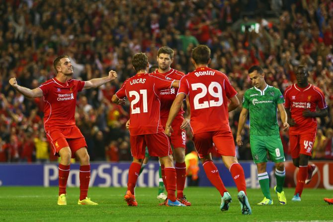 Gerrard is mobbed after securing victory for Liverpool over Ludogorets and later told ITV: "It's always nice to win a game, especially when you think you're going to drop two points. The game as a whole, we didn't do better than OK and have a lot to learn."