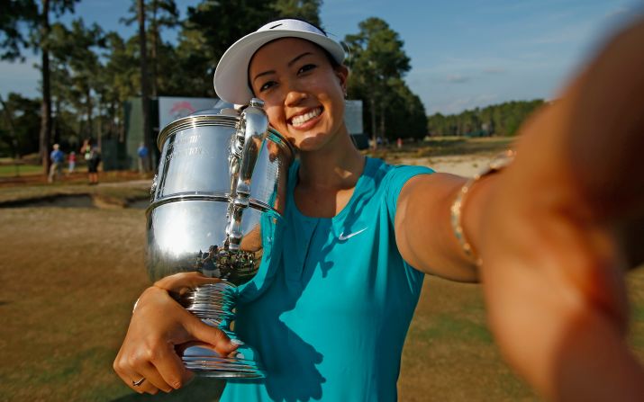 Michelle Wie, who has played in the U.S. Solheim Cup team, takes a selfie after she won her first major title -- the 2014 U.S. Women's Open.