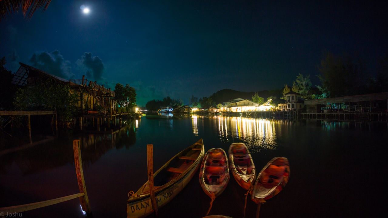 Fishing boats gently bob in the evening waters of Klong Prao Beach in <a href="http://ireport.cnn.com/docs/DOC-1127842">Koh Chang</a>, Thailand.