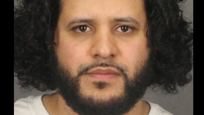 FILE- In this June 2, 2014, file photo provided by the Monroe County Sheriff's Office Mufid Elfgeeh, of Rochester, N.Y., is shown. Elfgeeh, who was accused of plotting to kill members of the U.S. military and others, is now facing new charges that he tried to aid the Islamic State group in Syria and Iraq. (AP Photo/Monroe County Sheriff's Office, File)
