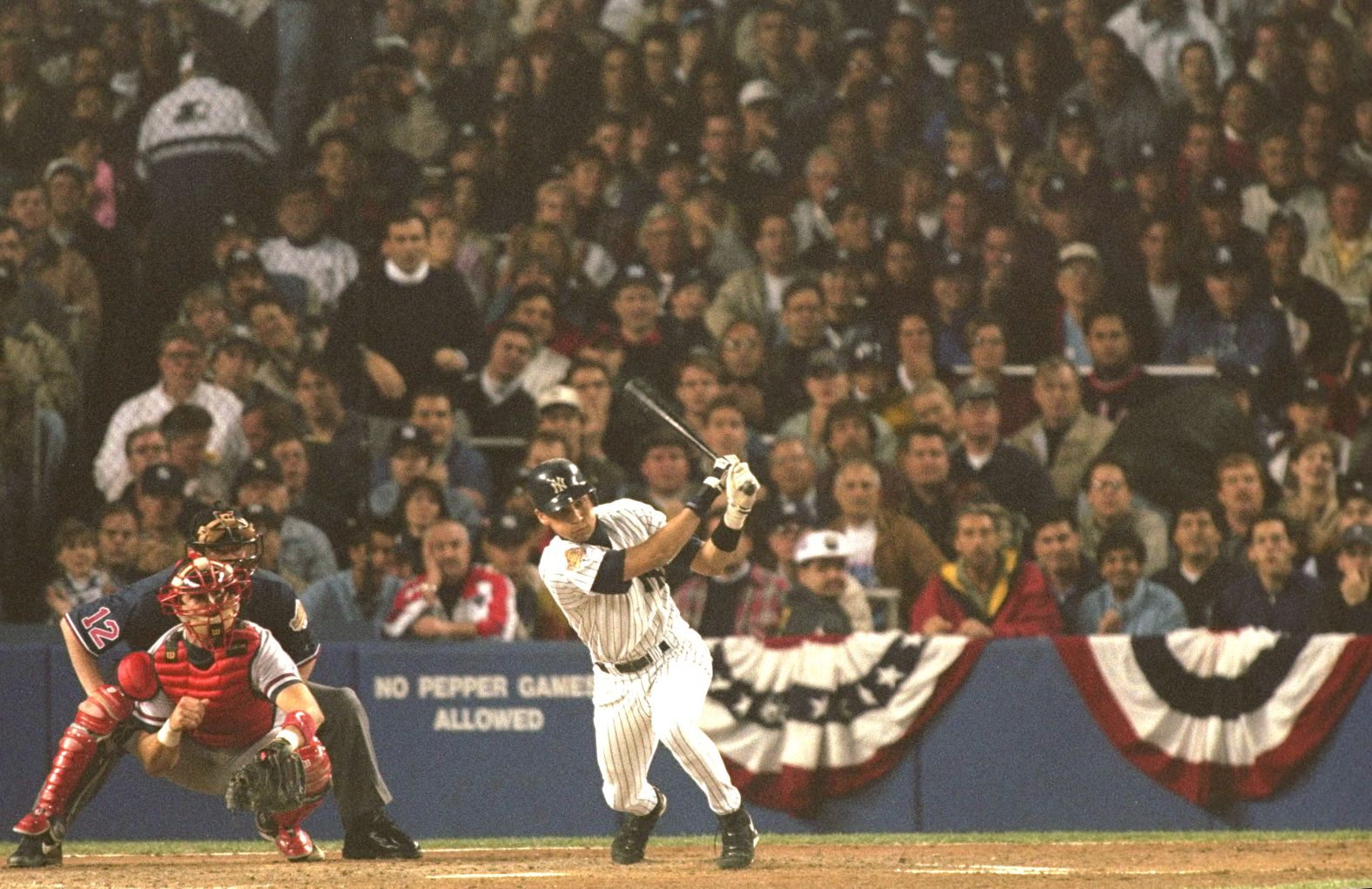 Jeter hits a ball during Game 6 of the World Series in October 1996. The Yankees defeated the Atlanta Braves in Jeter's first full season.