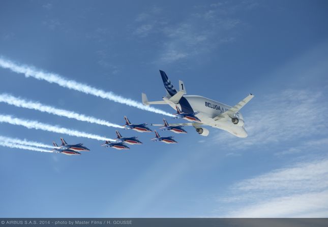 Airbus' Beluga transporter aircraft took part in a formation flight with the French Air Force's "Patrouille de France" aerobatic demonstration team in May 2014. 