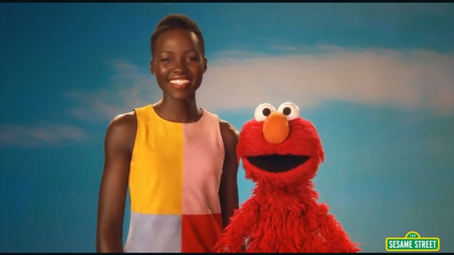 Lupita Nyong'o visited "Sesame Street" Tuesday with an important message of self-acceptance.