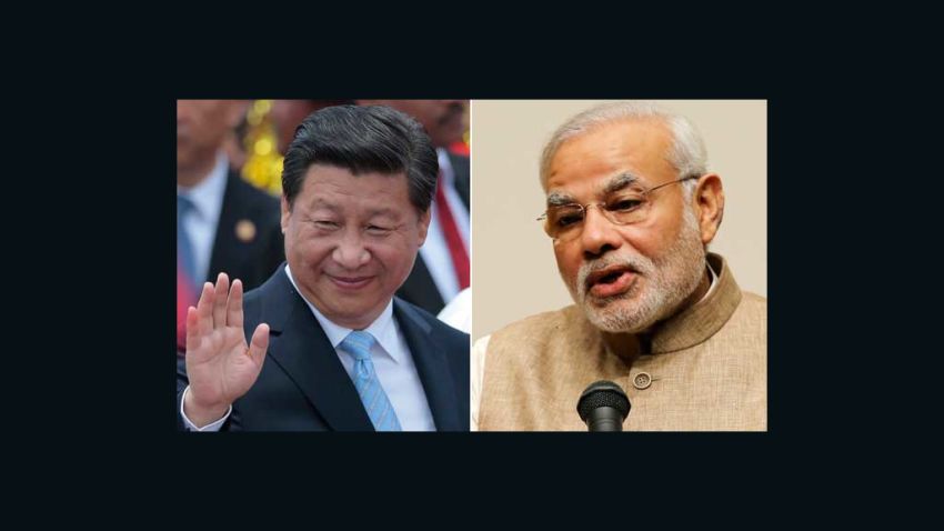Chinese President Xi Jinping (left) is in India to meet Indian Prime Minister Narendra Modi.