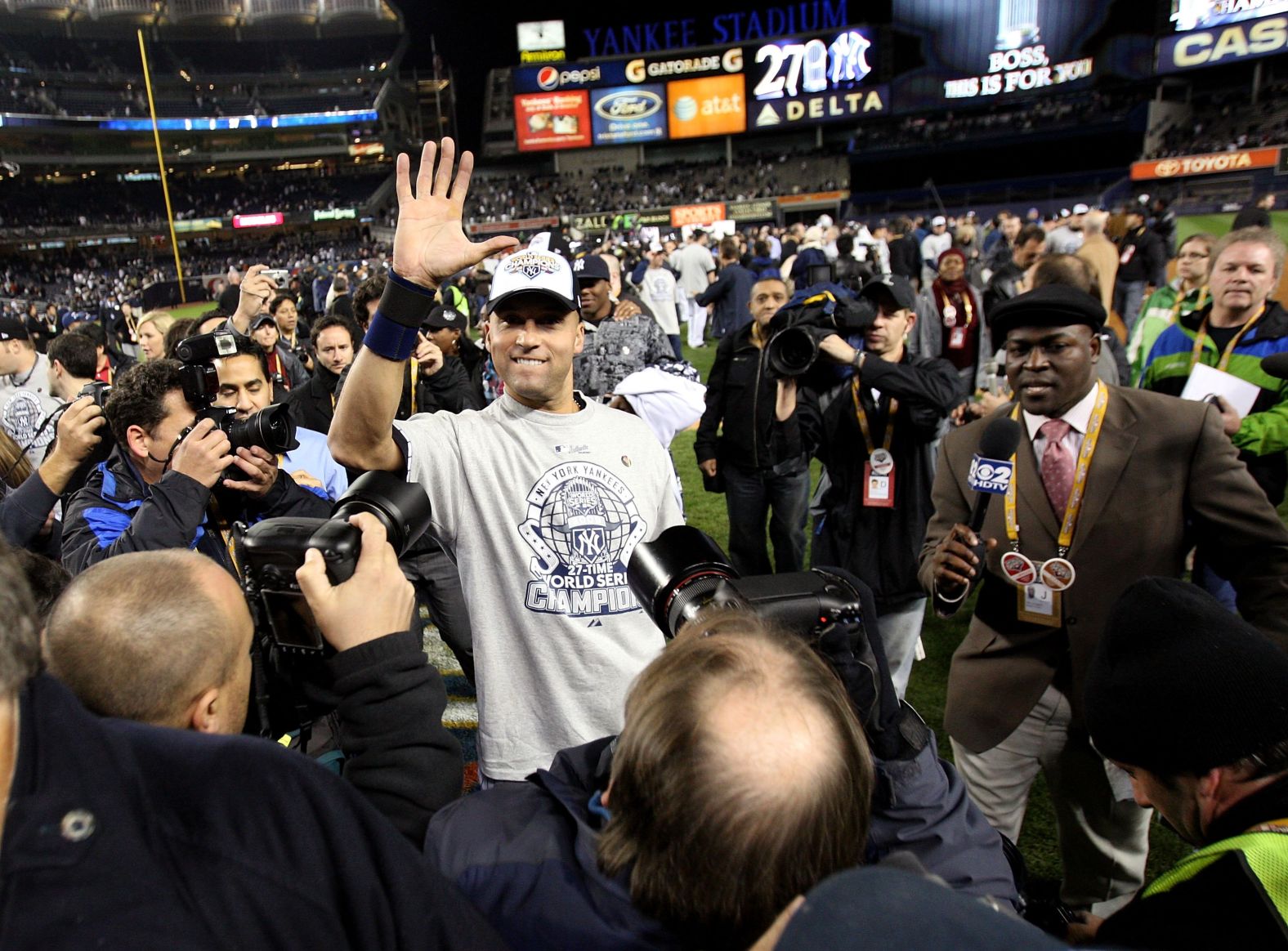 Jeter celebrates on the field after the Yankees won the 2009 World Series in New York. As Jeter's hand shows, this was his fifth world title with the Yankees.