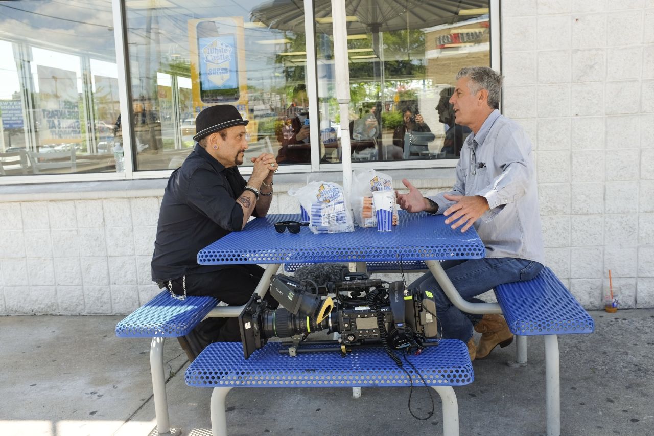 Bourdain chats with Handsome Dick Manitoba outside of White Castle.