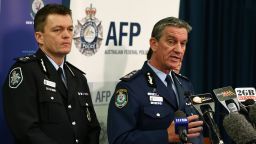 SYDNEY, AUSTRALIA - SEPTEMBER 18: NSW Police Commissioner Andrew Scipione speaks with AFP Acting Commissioner Andrew Colvin releasing details of an extensive NSW Joint Counter Terrorism Team operation in Sydney on September 18, 2014 in Sydney, Australia. Prime Minister Tony Abbott announced five days ago that the Australian terror threat has been raised from medium to high. (Photo by Cameron Spencer/Getty Images)