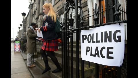 A young voter leaves a polling station September 18 in Edinburgh.