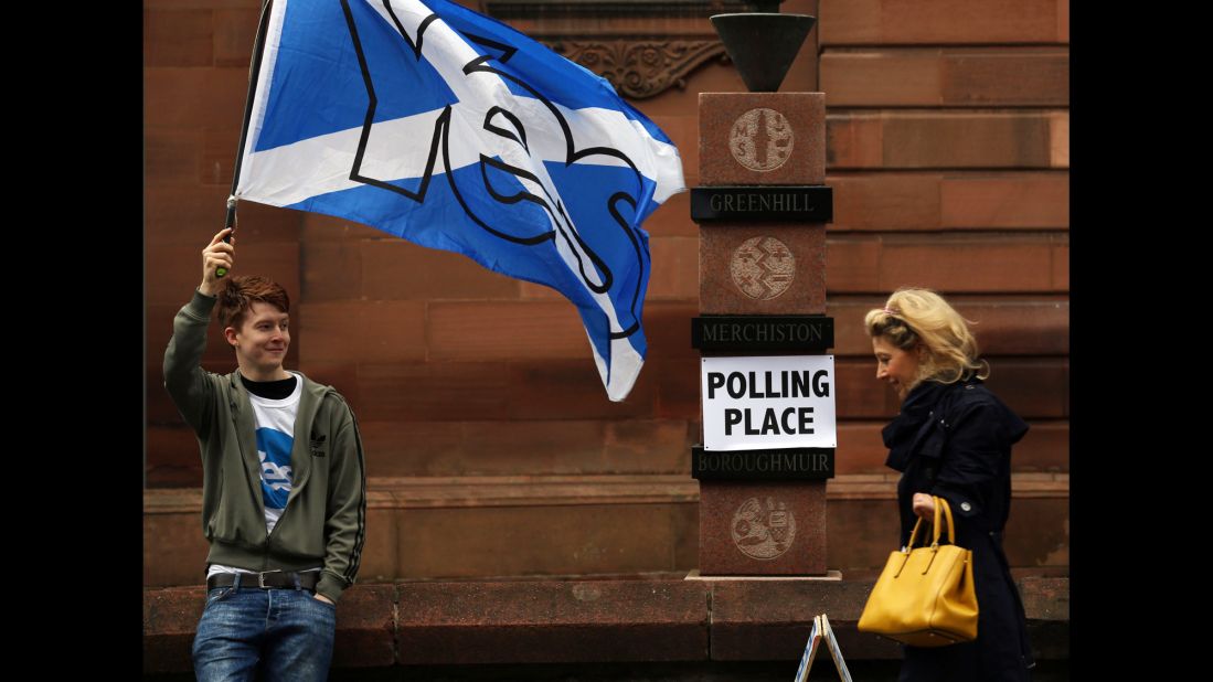 A voter arrives at a polling place September 18 in Edinburgh.