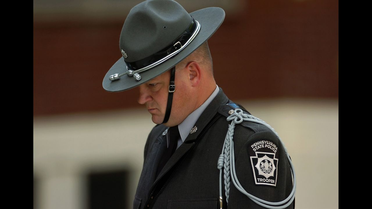A Pennsylvania state trooper arrives for the viewing of Dickson's body.