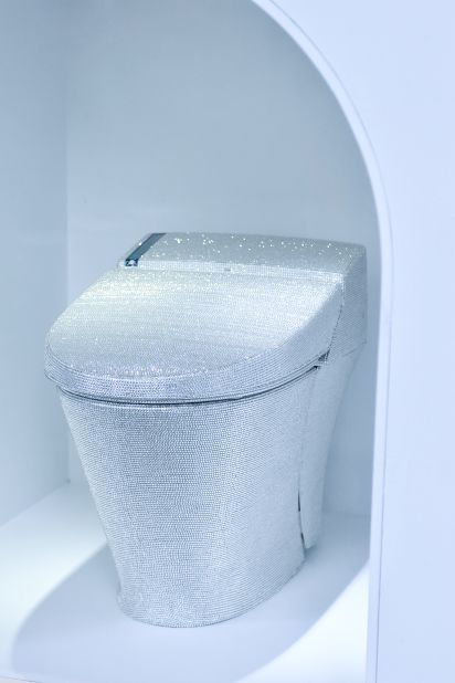 Who wouldn't want a blinged-out toilet seat?  A toilet decorated with crystal rhinestones is displayed with during the 'Toilet!? Human Waste and Earth's Future' exhibition. 