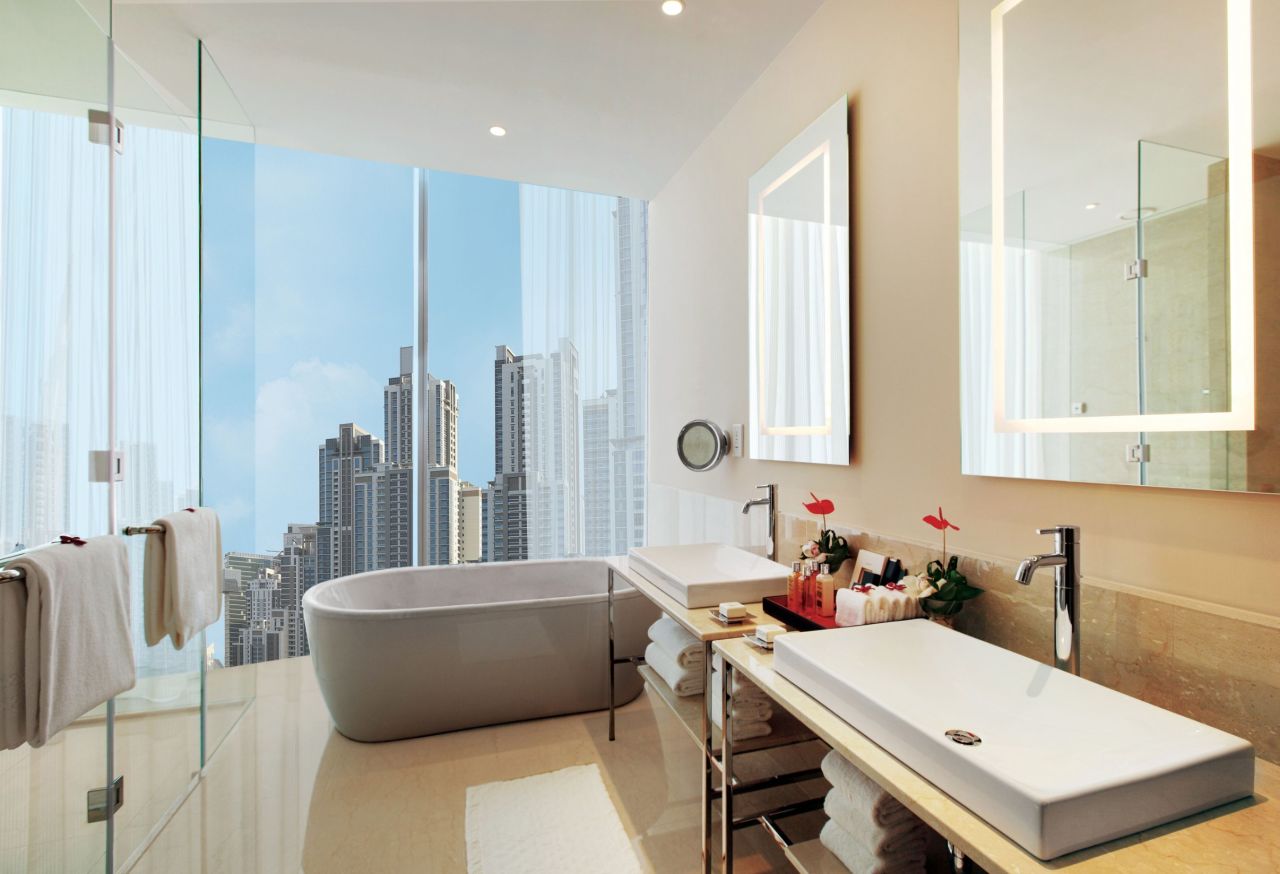 The most notable feature of the guest bathrooms at the Oberoi in Dubai is the floor-to-ceiling windows that display breathtaking uninterrupted views of the city's skyline.
