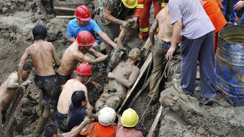 A man in Wuhan, China, is rescued Friday, September 12, after the construction site he was working at caved in. He was stuck in mud for more than five hours.