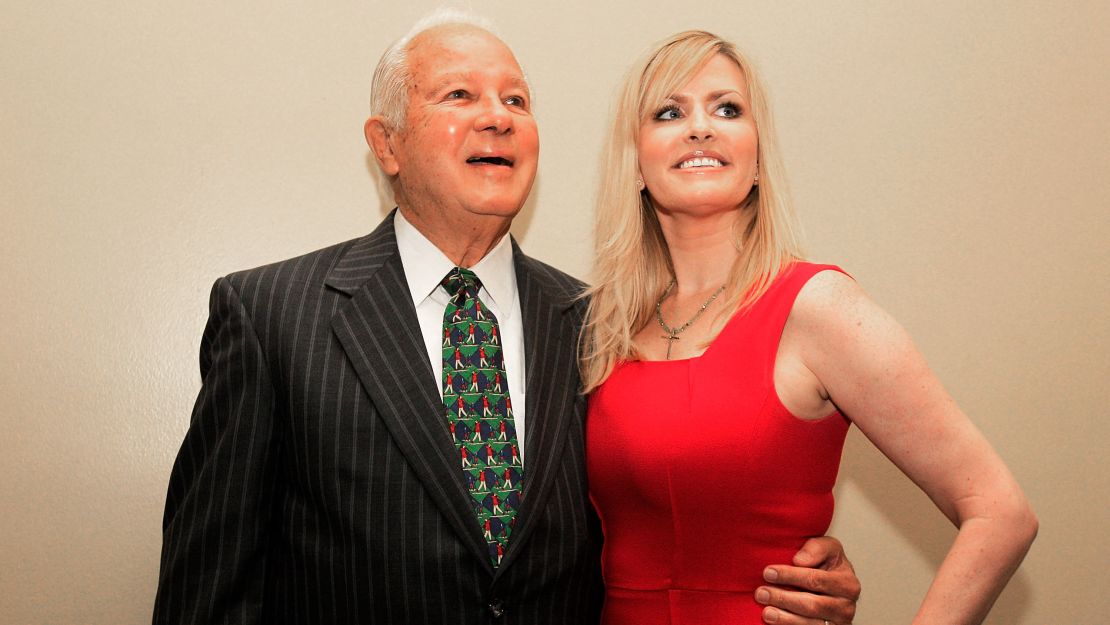 Former Louisiana Gov. Edwin Edwards poses with his wife Trina Scott Edwards in 2014.