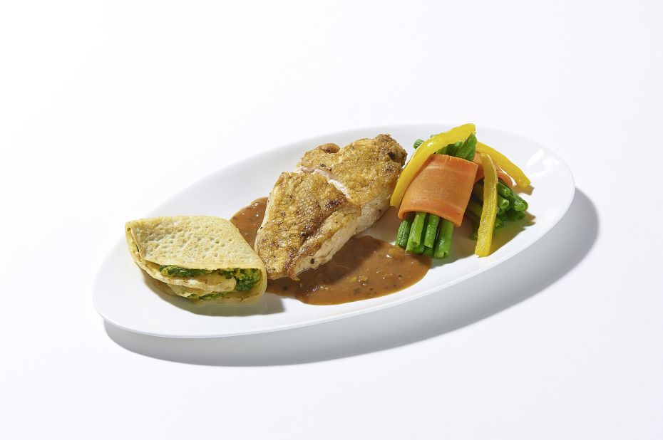 Busy families and business travelers who don't want to prepare and cook meals are among customers for Air Food One fare, including chicken in pepper sauce.