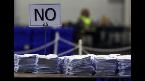 Ballots cast against Scottish independence get stacked on a table as votes are counted in Edinburgh on September 19.