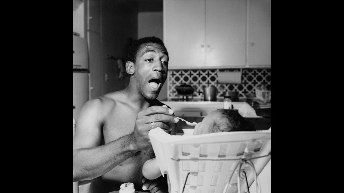 Cosby feeds one of his children in the mid-1960s. Cosby first made his name with his comedic storytelling, often based on his childhood experiences. In 2011, SPIN magazine put "To Russell, My Brother, Whom I Slept With" at the top of its <a href="http://www.spin.com/articles/spins-40-greatest-comedy-albums-all-time/?page=8" target="_blank" target="_blank">40 Greatest Comedy Albums of All Time list.</a>