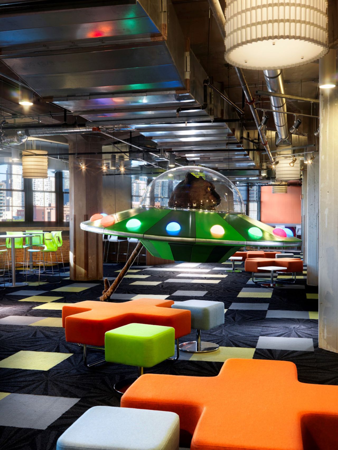 Internationally, Groupon's colorful offices in Chicago include an Enchanted Forest, a Fun Zone with swing sets, and a giant cat in a spaceship. You can tour the office during Chicago's Open House event, October 18-19.