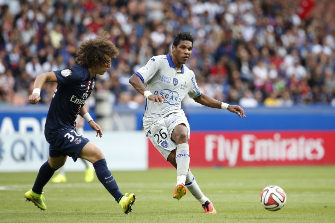 <strong>November 2014:</strong> Brandao, right, was given a one-month jail sentence for headbutting Paris Saint-Germain's Thiago Motta in August.