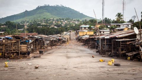 In September, a local market area stands empty as Sierra Leone's government enforces a three-day lockdown. The economies of Sierra Leone, Guinea and Liberia will lose at least $1.6 billion in economic growth in 2015, <a href="https://www.worldbank.org/en/news/press-release/2015/01/20/ebola-most-african-countries-avoid-major-economic-loss-but-impact-on-guinea-liberia-sierra-leone-remains-crippling" target="_blank" target="_blank">according to the World Bank.</a> With poverty comes chronic disease and undernourishment, which can also have <a href="http://www.africa.undp.org/content/dam/rba/docs/Reports/ebola-west-africa.pdf" target="_blank" target="_blank">serious consequences</a> on a population's health.