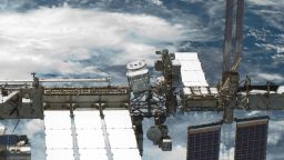CERN's Alpha Magnetic Spectrometer rides atop the International Space Station to detect signs of mysterious dark matter.