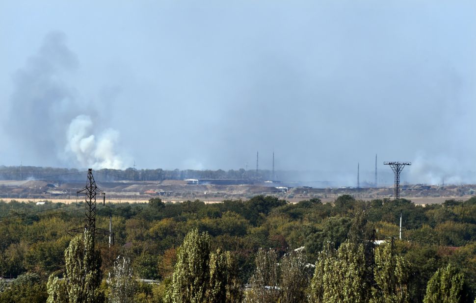 Smoke rises after an explosion at a weapons factory controlled by pro-Russian rebels near Donetsk on September 20. The cause of the explosion was not immediately known.