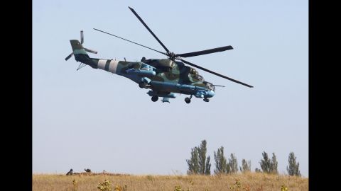 A Ukrainian helicopter patrols an area near Donetsk on September 20.