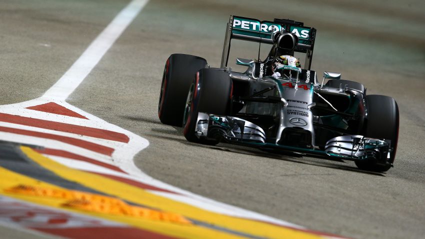 Lewis Hamilton of Great Britain and Mercedes GP drives during qualifying ahead of the Singapore Formula One Grand Prix at Marina Bay Street on September 20, 2014 in Singapore, Singapore. (Photo by Mark Thompson/Getty Images)