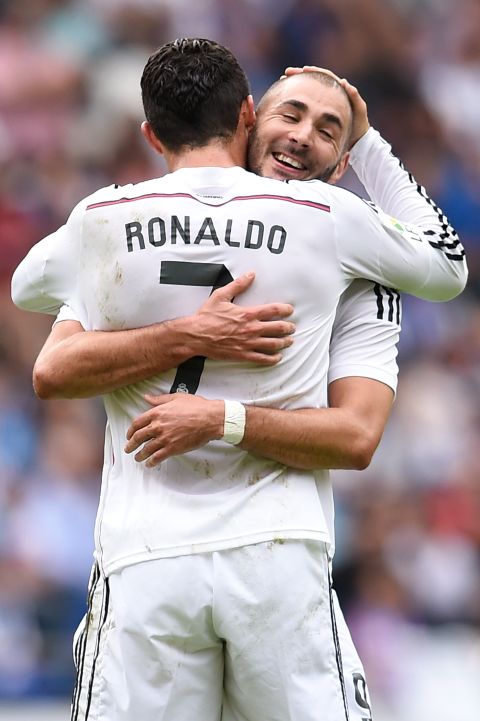 World player of the year Ronaldo celebrates with Karim Benzema after a goalkeeping error by German Lux gifted him a second goal for 3-0. 