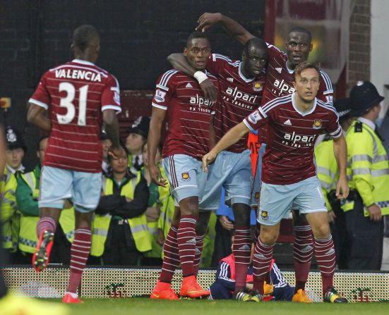 Senegalese striker Diafra Sakho (second left) celebrates with his teammates after making it 2-0 with his third goal for West Ham since signing from French club Metz. 