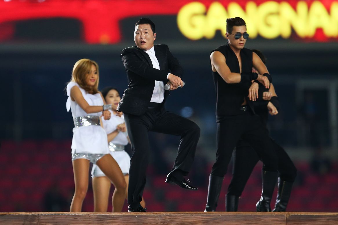 Pop sensation Psy performs his horse dance during the Opening Ceremony of the 2014 Asian Games, September 19.