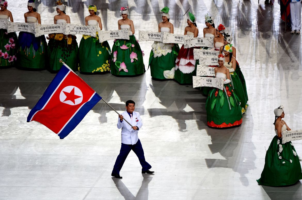 The North Korean team received a rousing reception as they entered the stadium on September 19. This year's flag bearer is boxing coach Sok Yong-Bom who leads a North Korean delegation of 273 people.