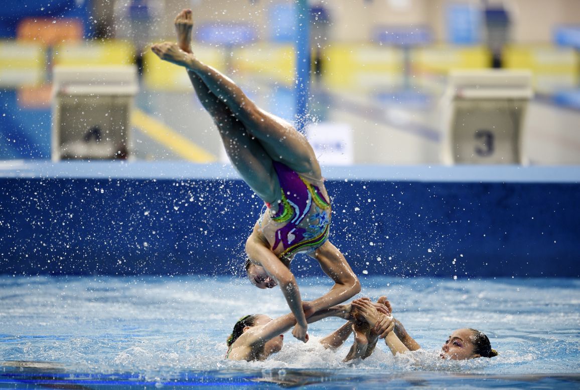 North Korea's swimmers compete in the team technical routine synchronized swimming event at the Munhak Park Tae-hwan Aquatics Center on September 21.