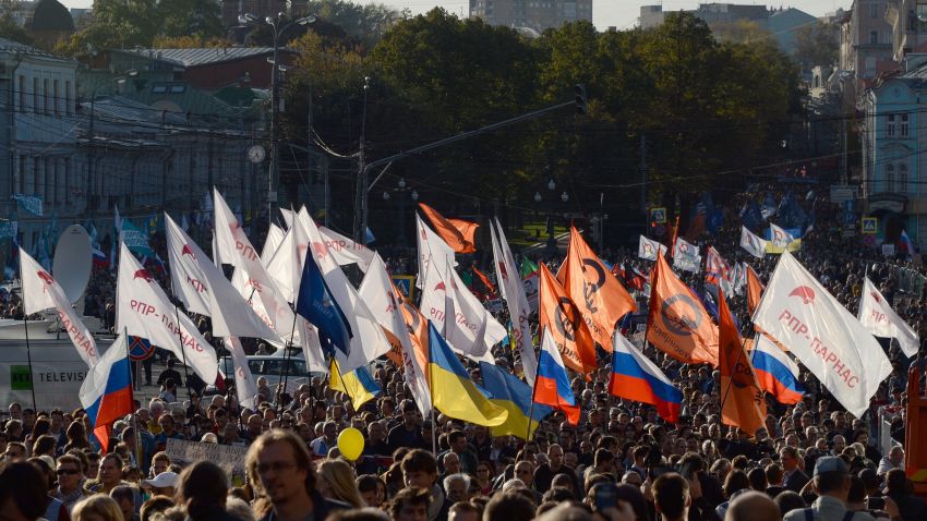 Anti-war protestors march in central Moscow on September 21, 2014.