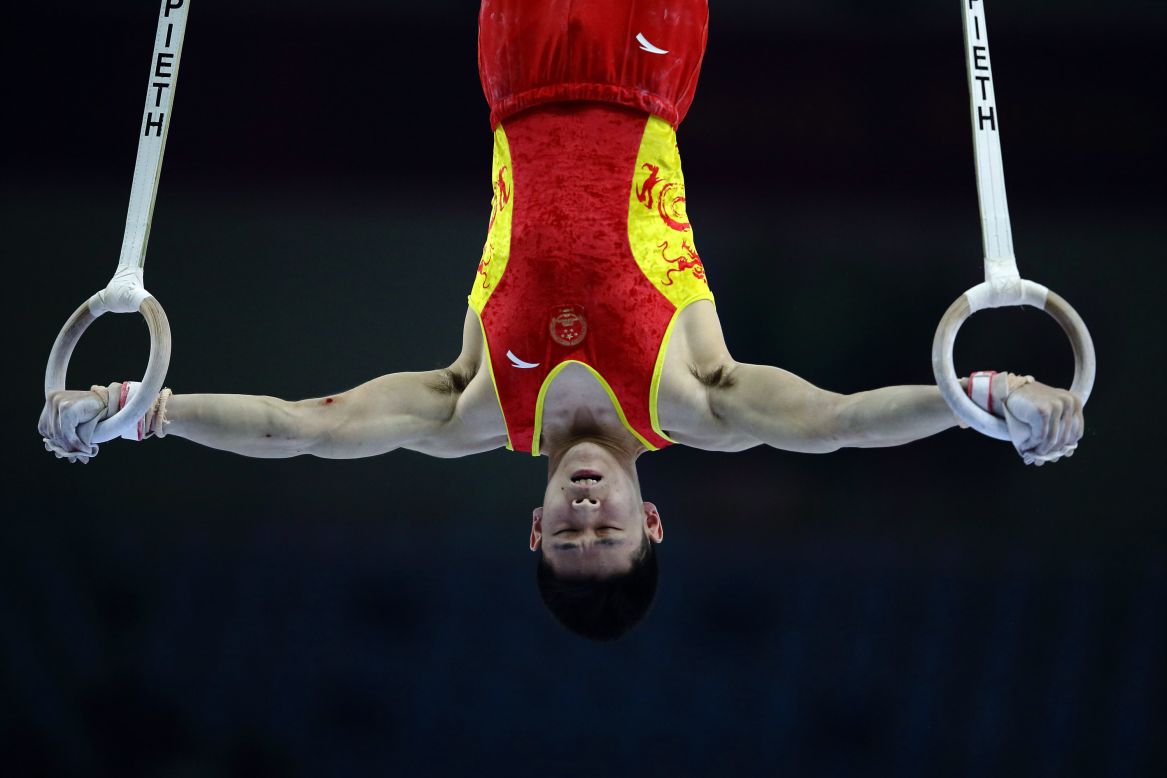 INCHEON, SOUTH KOREA - SEPTEMBER 21: Wang Peng competes in the rings routine of the men's qualification and team final during the 2014 Asian Games at Namdong Gymnasium on September 21, 2014 in Incheon, South Korea. (Photo by Suhaimi Abdullah/Getty Images)