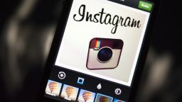 The Instagram logo is displayed on a smartphone on December 20, 2012 in Paris. 
