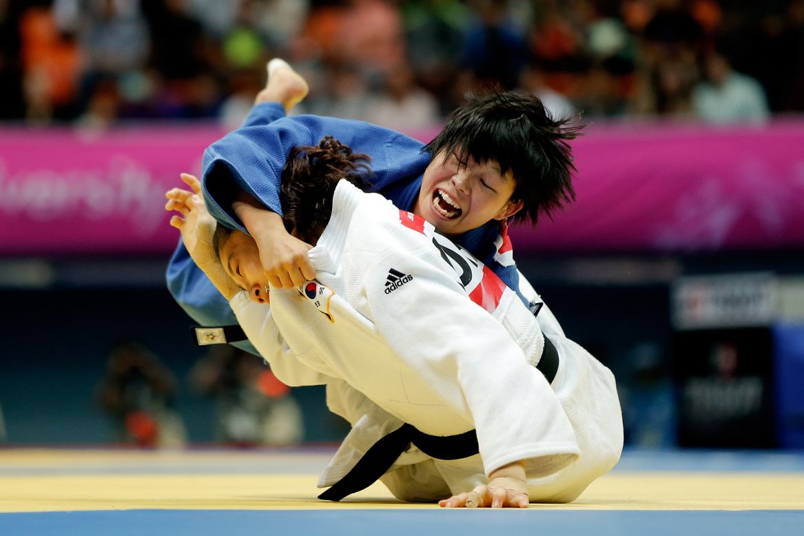 Japanese juduka Anzu Yamamoto seen on her way to winning gold against South Korea's Kim Jandi in the Women's -57 kg Final at Dowon Gymnasium, September 21.