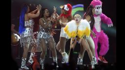 Miley Cyrus, second from right, performs during her Bangerz tour at the Arena Ciudad de Mexico, in Mexico City, on September 19, 2014.
