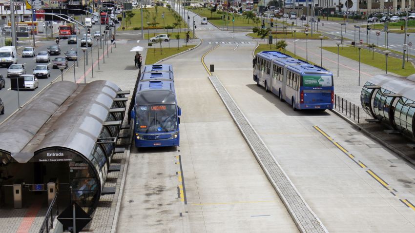 Buses  in Curitiba, Brazil have dedicated lanes in the centre of the road and easy-access stop to board. Transfer stations enable smooth transitions between bus lines.