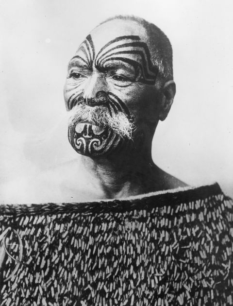 A Maori chief from New Zealand, circa 1950, with the traditional facial tattoos.