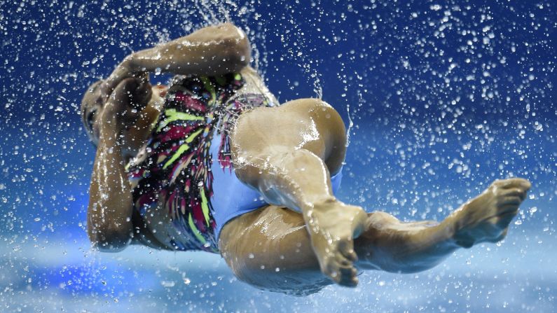 A member of Japan's synchronized swimming team twists out of the water Monday, September 22, while competing in the Asian Games in Incheon, South Korea.