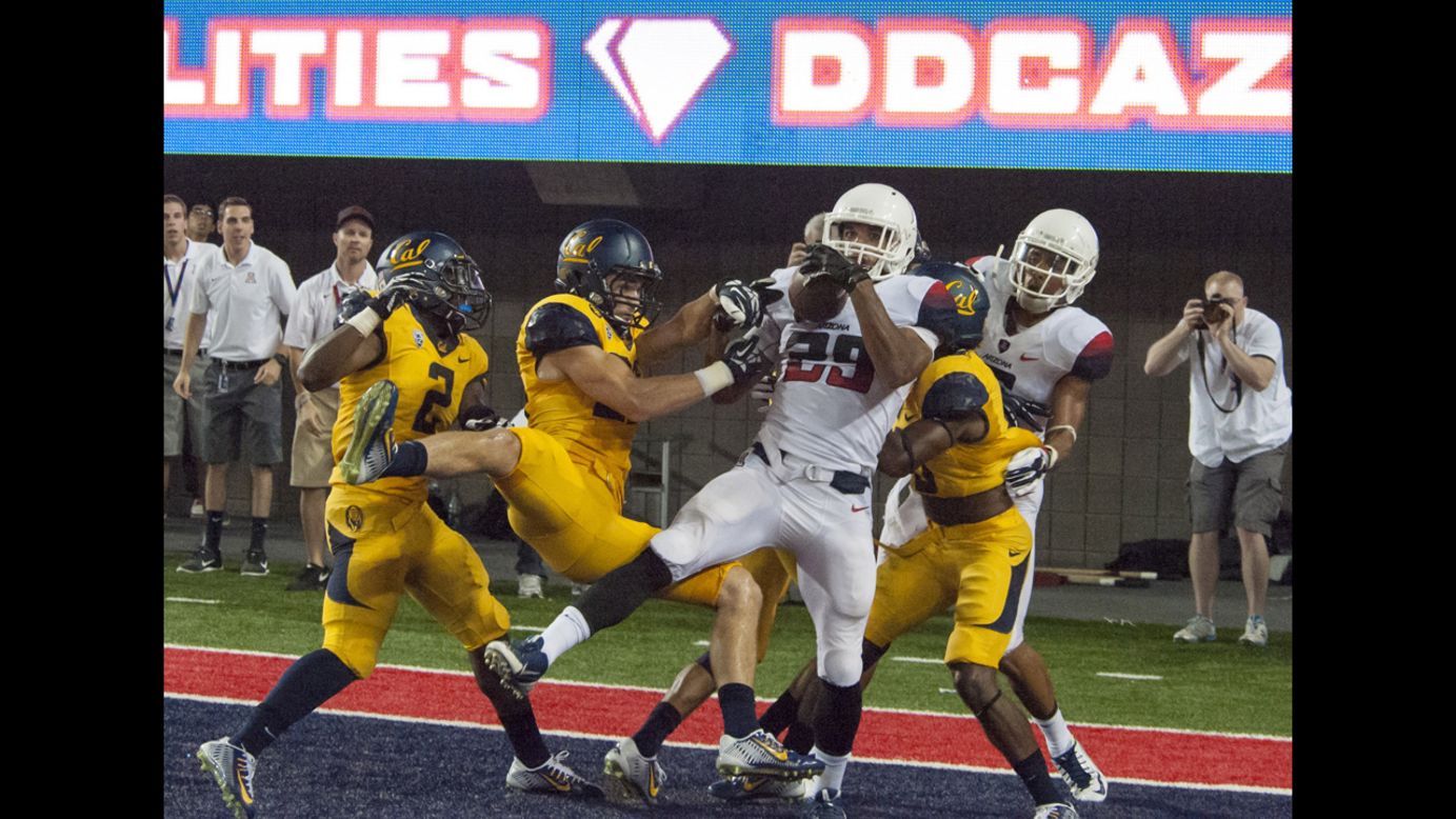 Arizona wide receiver Austin Hill pulls down a last-second "Hail Mary" pass from Anu Solomon to complete an epic fourth-quarter comeback Saturday, September 20, in Tucson, Arizona. The catch, which is being called the "Hill Mary," was the final score of Arizona's 49-45 win over California. Arizona, which trailed 31-13 late in the game, scored 36 points in the fourth quarter.