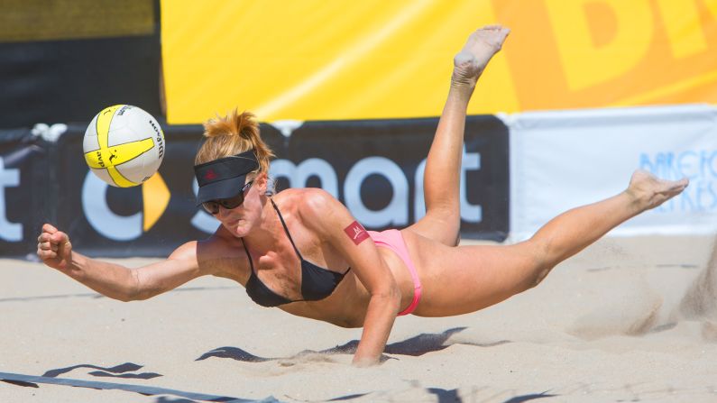 Beach volleyball player Emily Day dives for the ball Friday, September 19, during a match at the AVP Championships in Huntington Beach, California.