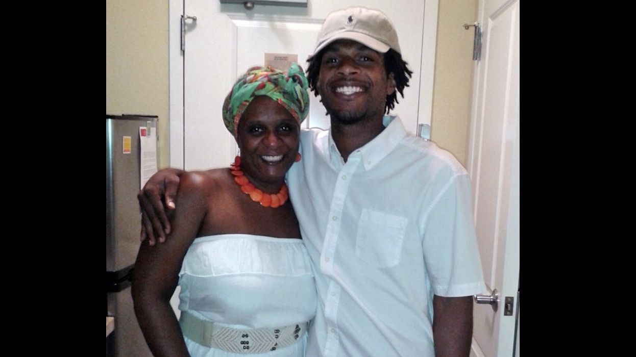 John Crawford, right, poses with his mother, Tressa Sherrod, in this undated photo provided by the family.